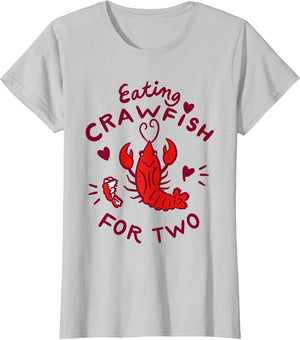 Eating Crawfish for Two Crawfish Boil Pregnancy Announcement