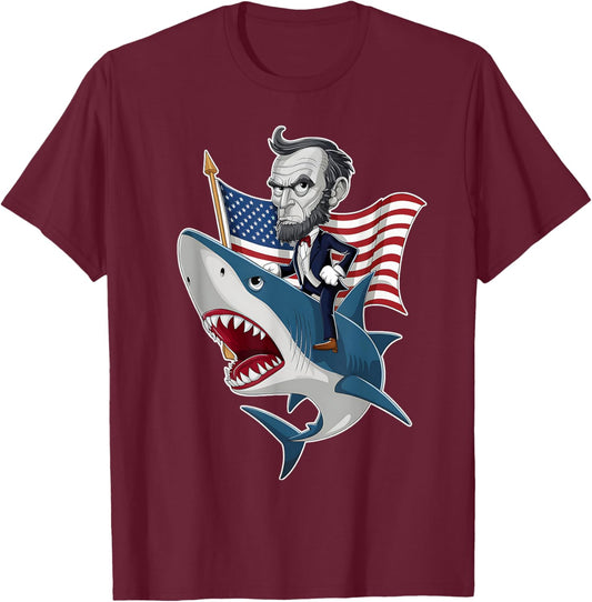 Abraham Lincoln Riding A Shark 4th Of July Patriotic Graphic T-Shirt - T-Shirt | Maroon