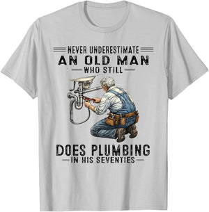 Never Underestimate Old Man Does Plumbing Humor T-Shirt - T-Shirt | Ash