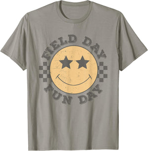 Field Day Fun Day 2025 Groovy Smile Face Checkered Students T-Shirt - T-Shirt | Sand