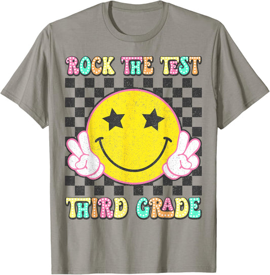 Rock The Test Day 3rd Grade Teacher Third Grade Testing Day T-Shirt - T-Shirt | Sand