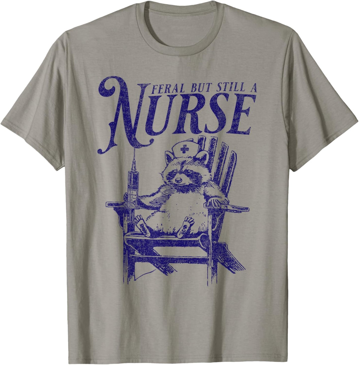Feral But Still A Nurse Funny Feral Nurse Raccoon Nurse T-Shirt - T-Shirt | Sand