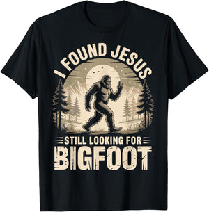 I Found Jesus Still Looking for Bigfoot Funny T-Shirt - T-Shirt | Black