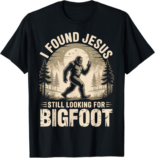 I Found Jesus Still Looking for Bigfoot Funny T-Shirt - T-Shirt | Black